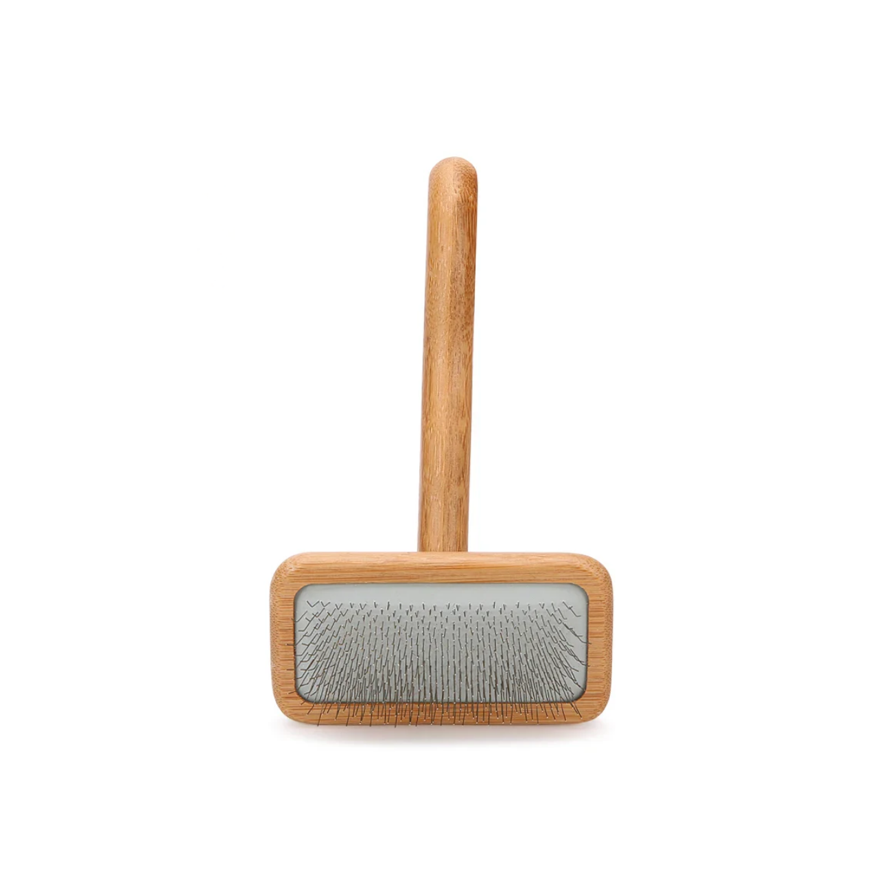 Pet grooming brush with wooden handle and metal surface on a white background
