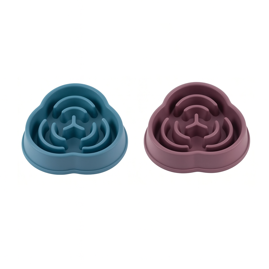 Two silicone pet bowls, one blue and one purple, on a white background