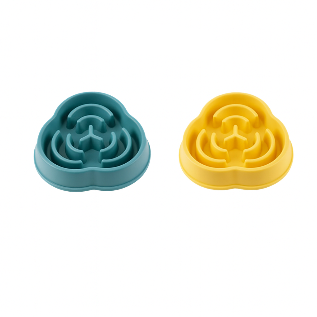 Two slow feeders, one blue and one yellow, on a white background 