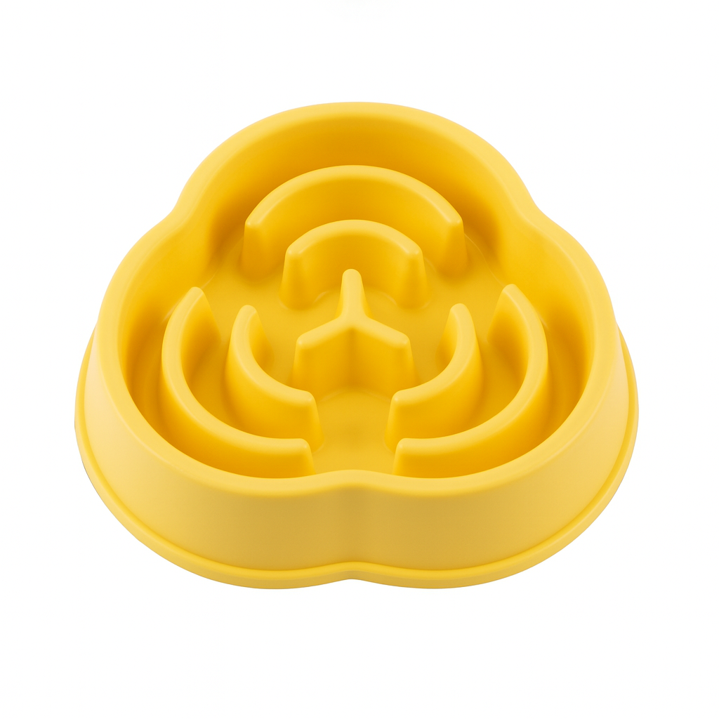 Yellow petal shaped silicone pet feeder on a white background