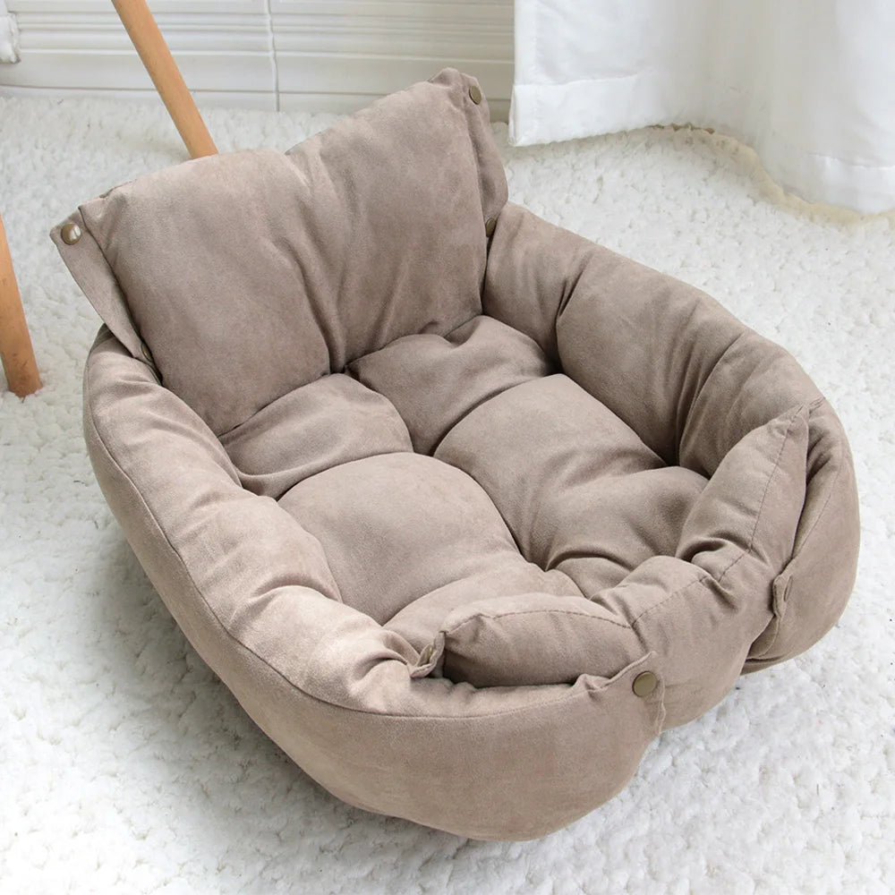 A beige cushioned convertible pet bed arranged in sofa style.