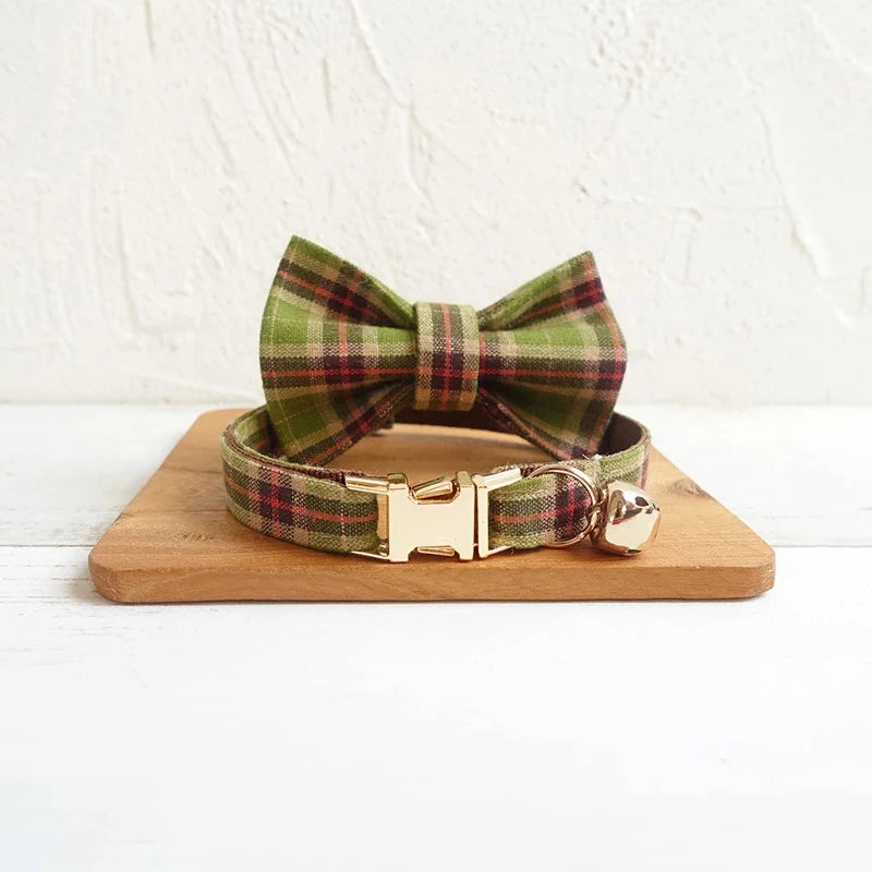 Green plaid bow tie collar for dogs and cats with gold buckle.