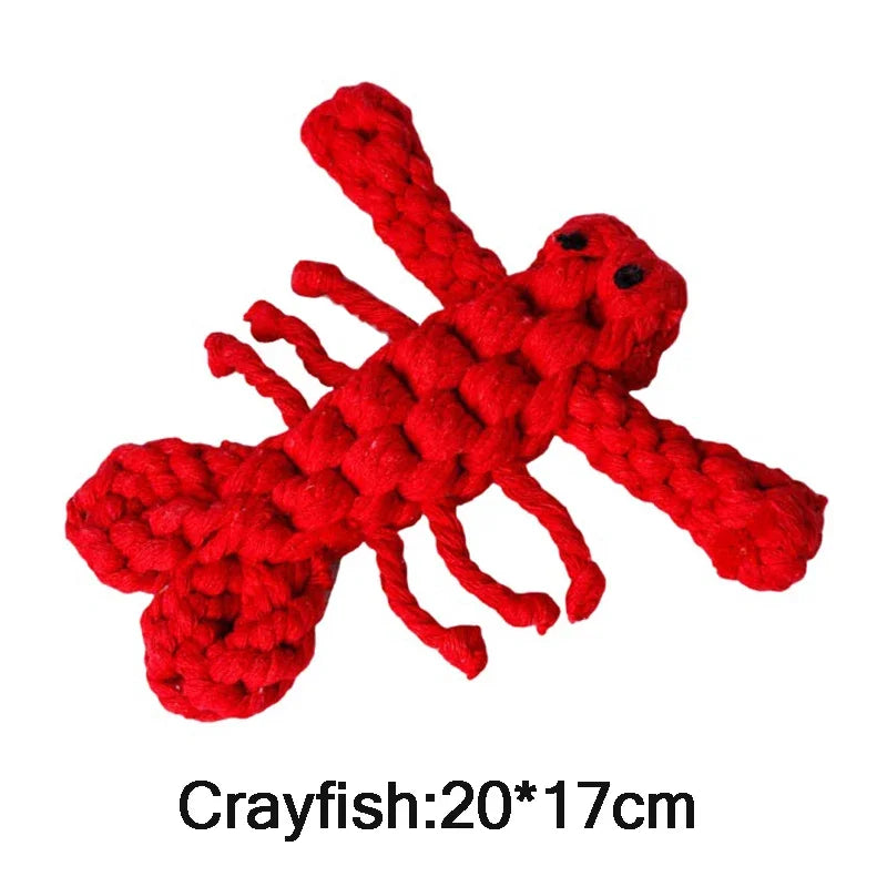 Red crochet crayfish toy with dimensions on a white background