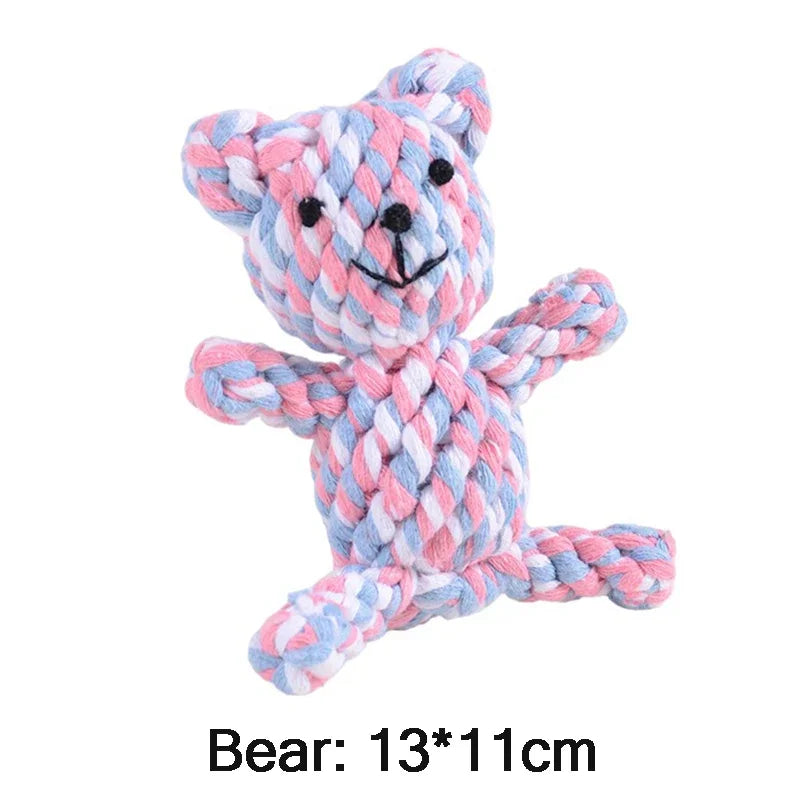 Multicolored braided bear-shaped toy on a white background