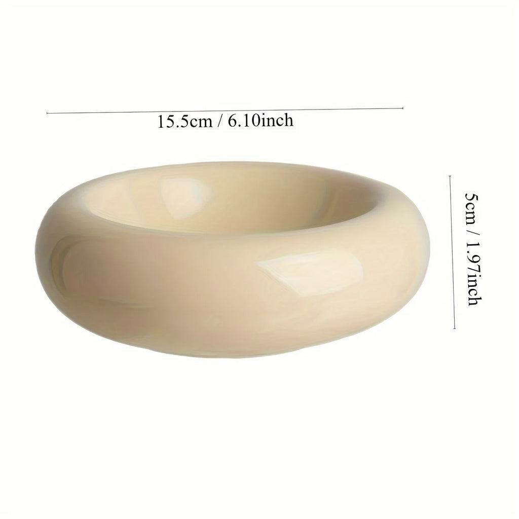 Beige bowl with measurements on a white background