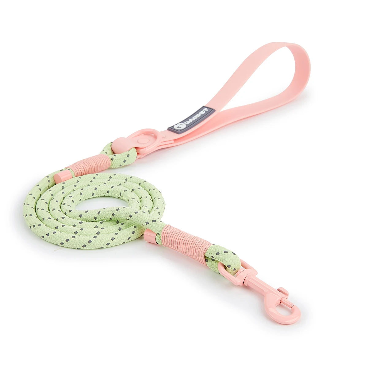 Dog leash with pink handle and green pattern on a white background