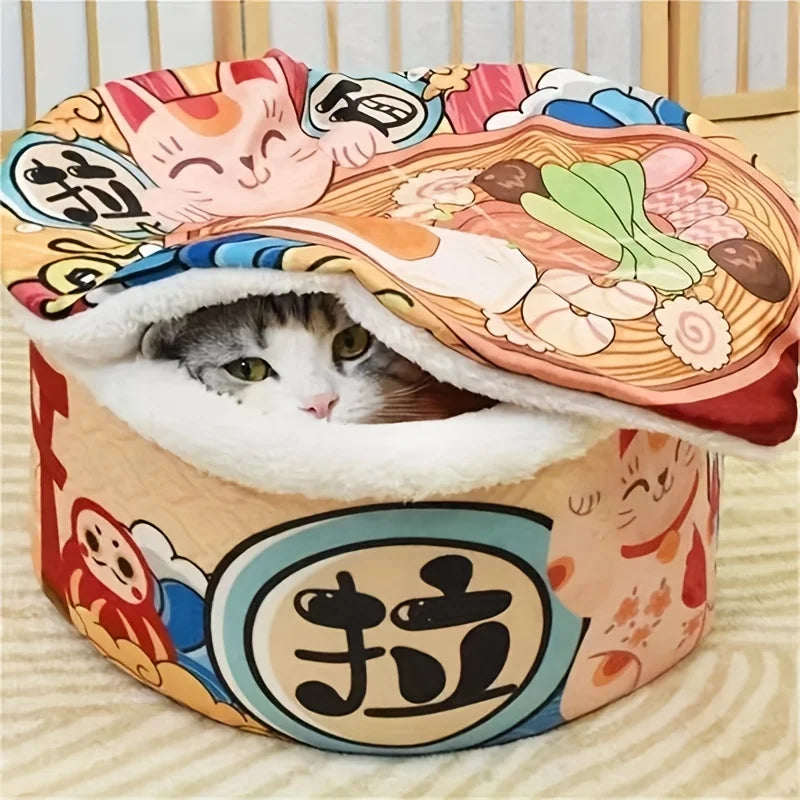Cat peeking out from ramen pet bed with colorful noodle lid.