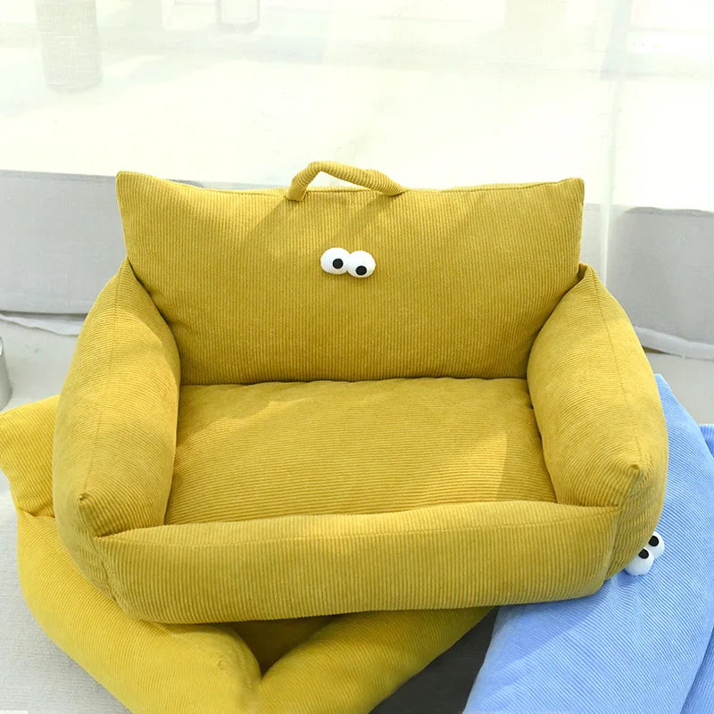 Mustard yellow corduroy velvet pet bed with cushioned sides and cute design.