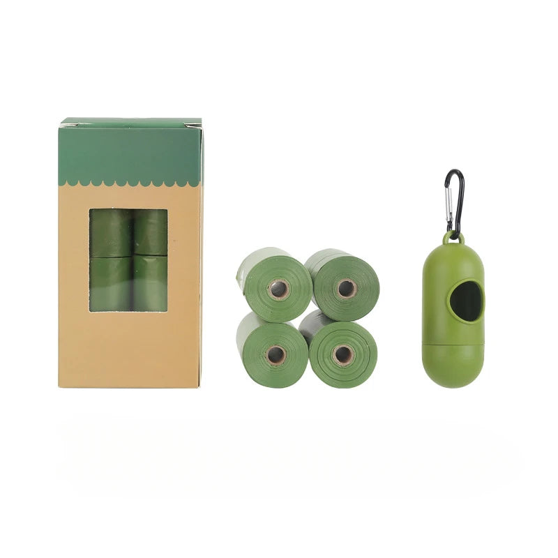 4-roll starter pack of Green waste bags with a dispenser and packaging on a white background