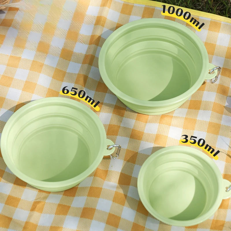 Three sizes of green GoBowl™ travel bowls displayed side by side (350ml, 650ml, 1000ml).
