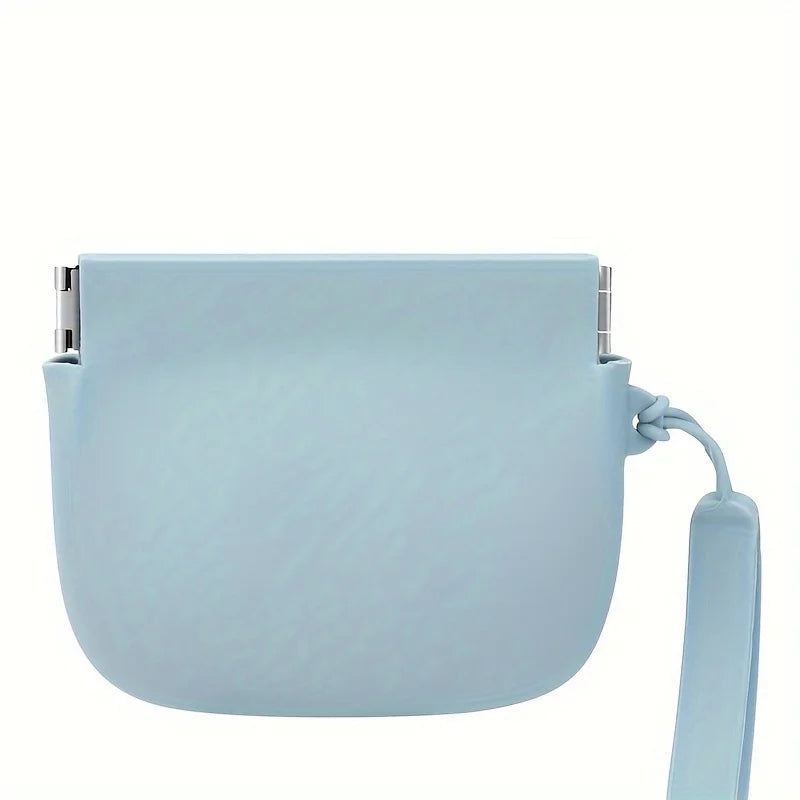 Light blue silicone treat pouch with soft-touch material.