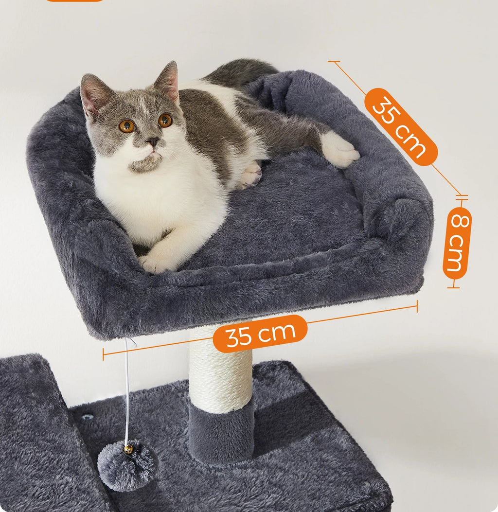 Cat lying on a gray cat tree with measurements indicated