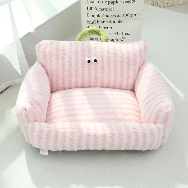 Pink striped velvet pet bed with soft cotton filling and cozy raised arms.