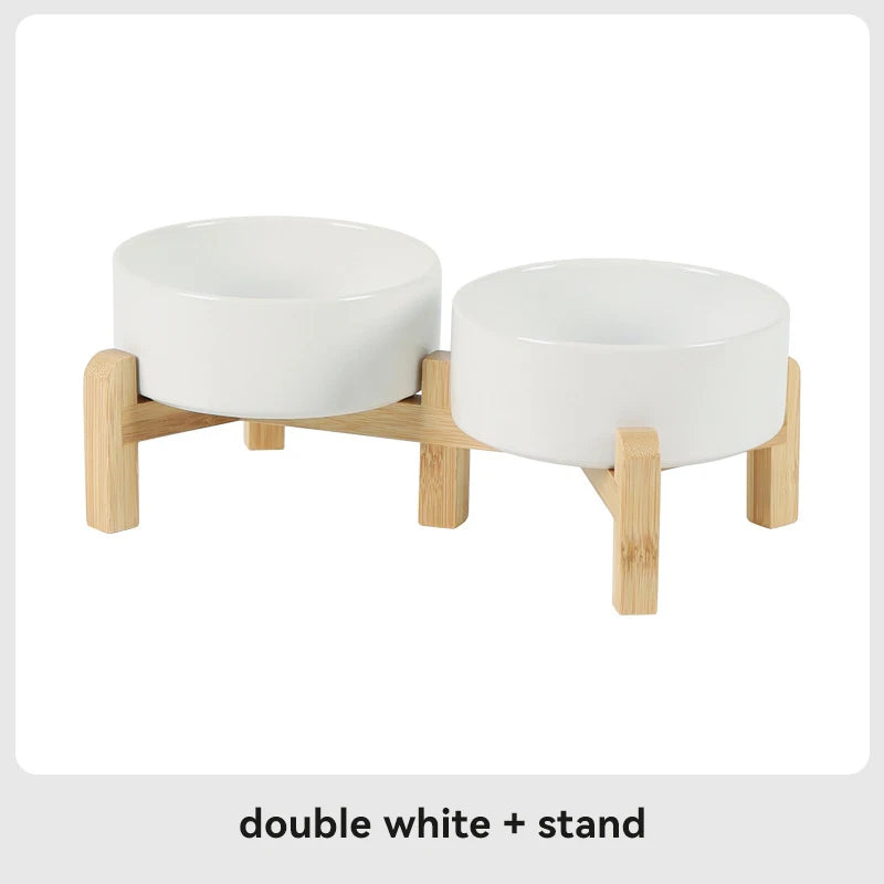 Double white pet feeder with wooden stand on a white background