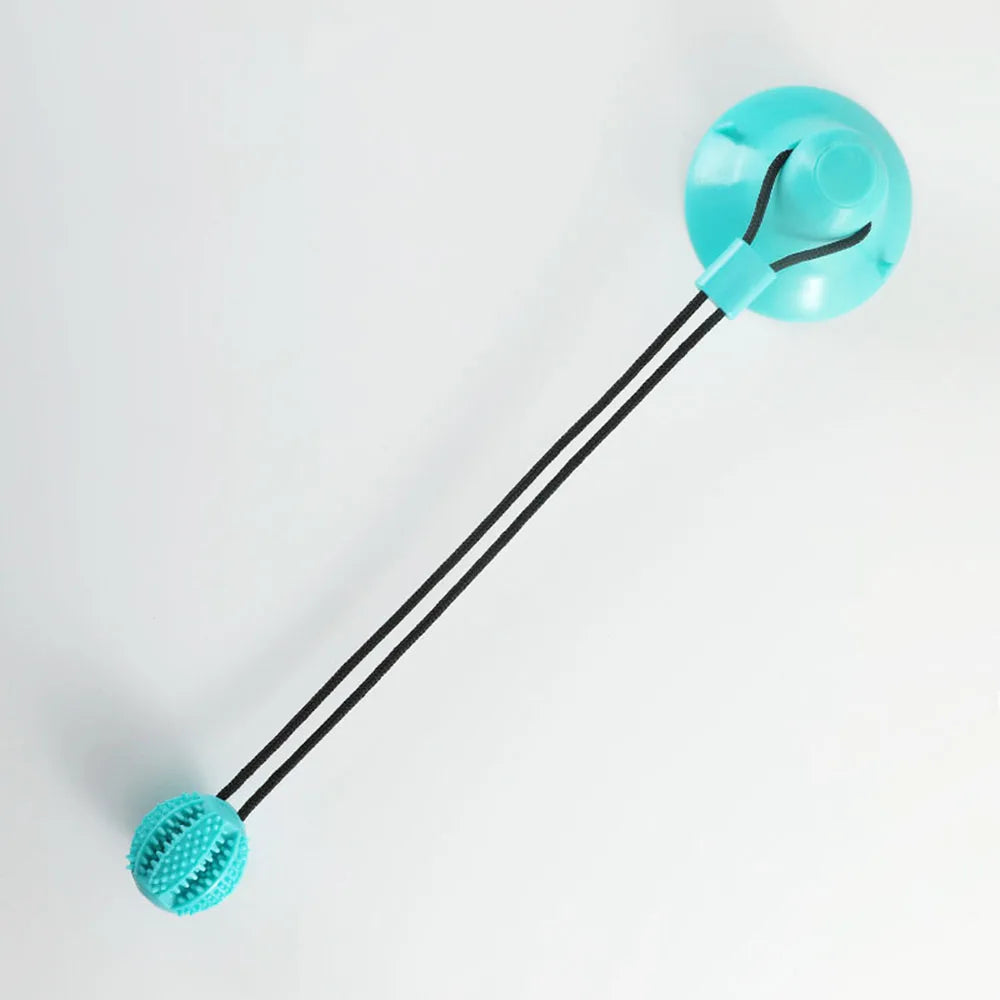Dog toy with suction base and chew ball attached by rope – interactive tug toy for dogs