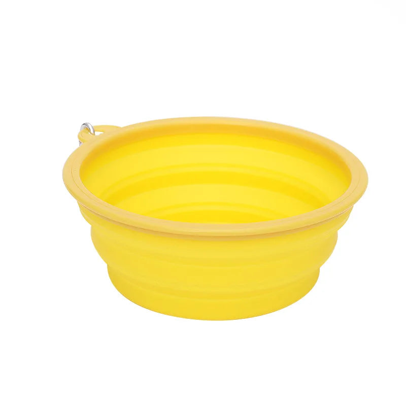 Yellow foldable bowl on a white background