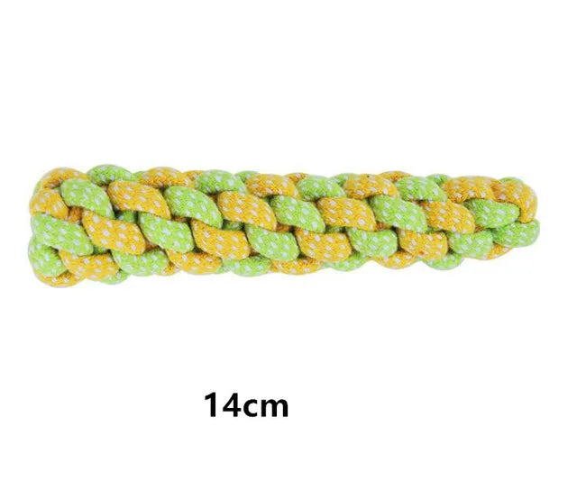 Braided green and yellow toy with a measurement label on a white background