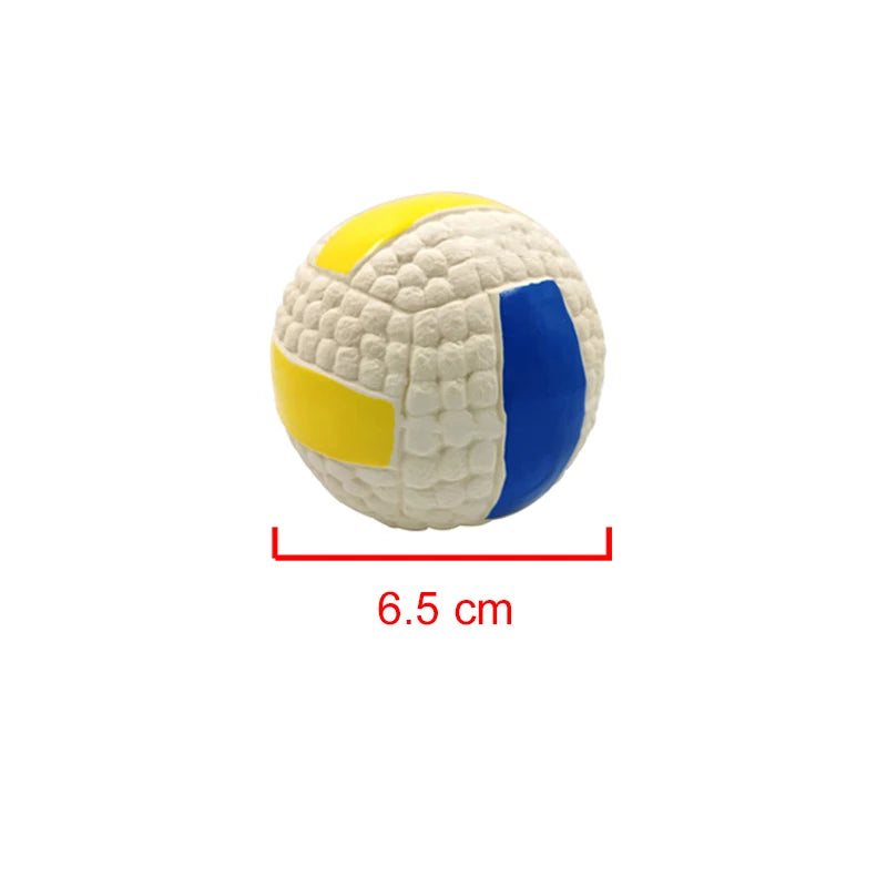 Small volleyball squeaky dog toy with textured surface, yellow and blue sections, on a white background with a measurement label.
