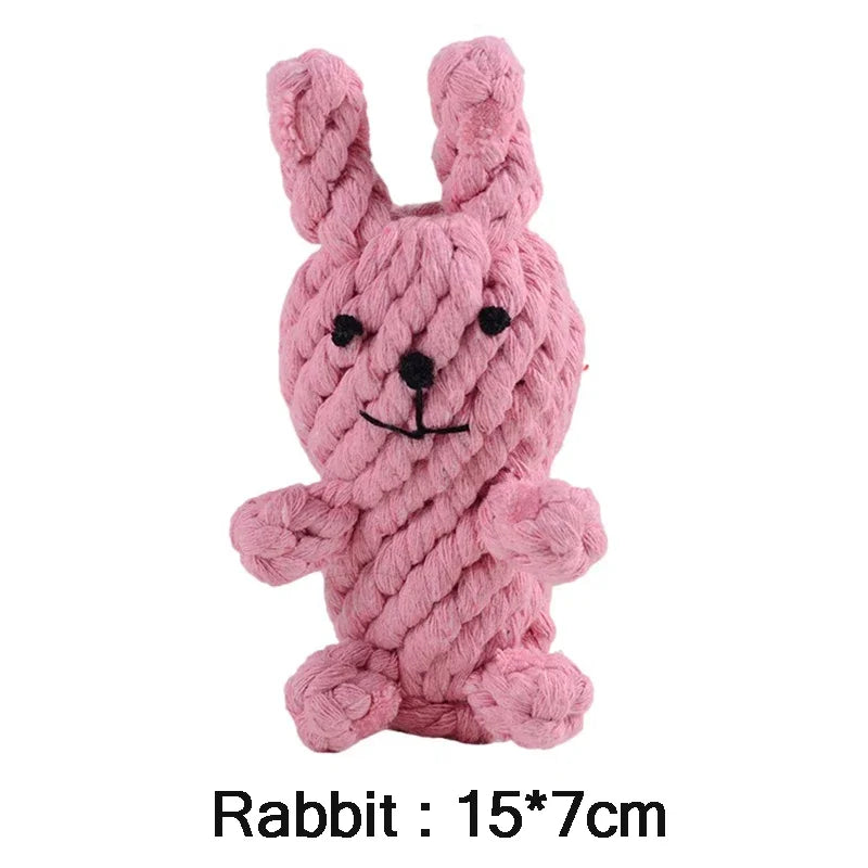 Pink knitted rabbit-shaped toy on a white background