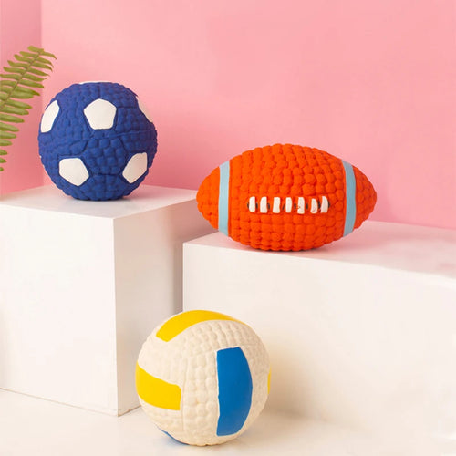 Set of pet toy plush sports balls including a football, soccer ball, volleyball, and baseball.