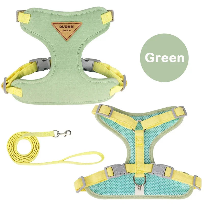 Green with yellow straps pet harness with matching leash, breathable and adjustable for pets.