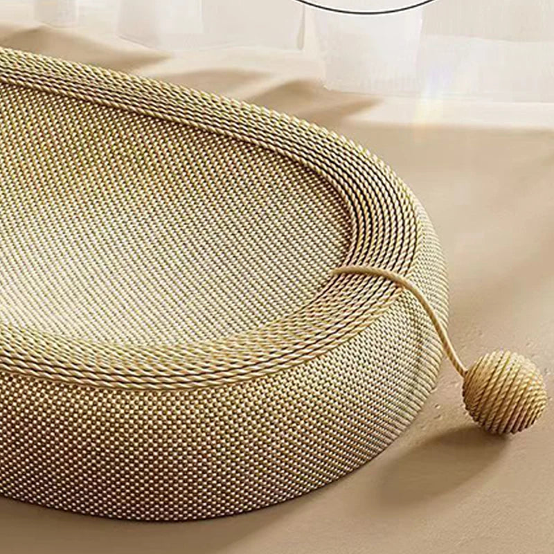 Close-up of textured sisal-style scratching surface with attached toy ball.