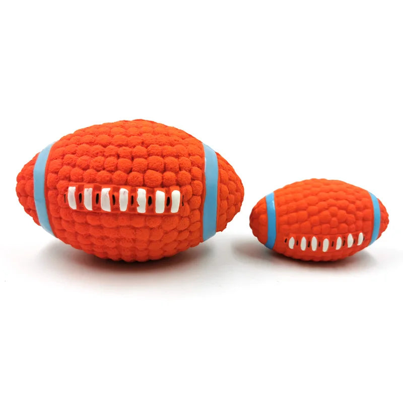 Two orange textured dog toys with blue bands on a white background