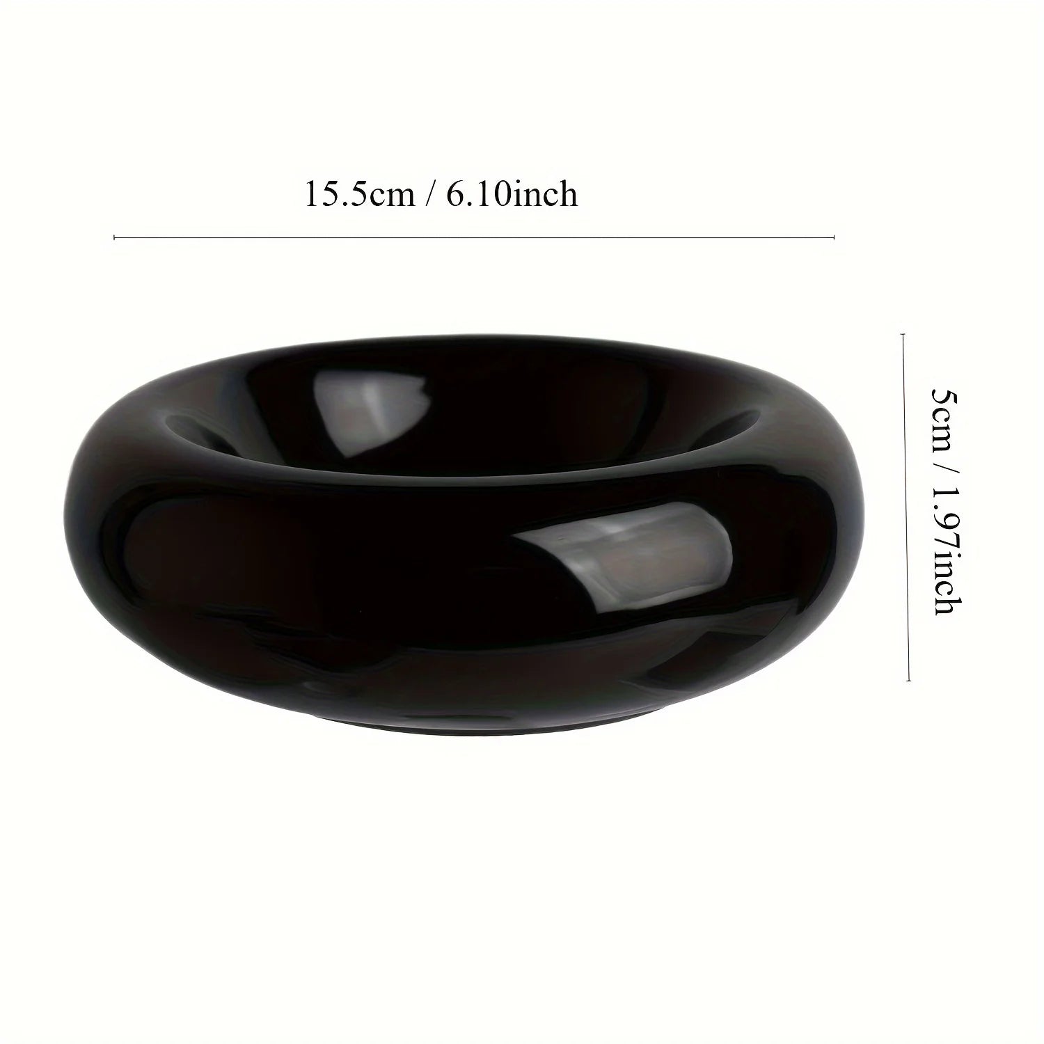 Black ceramic bowl with measurements on a white background