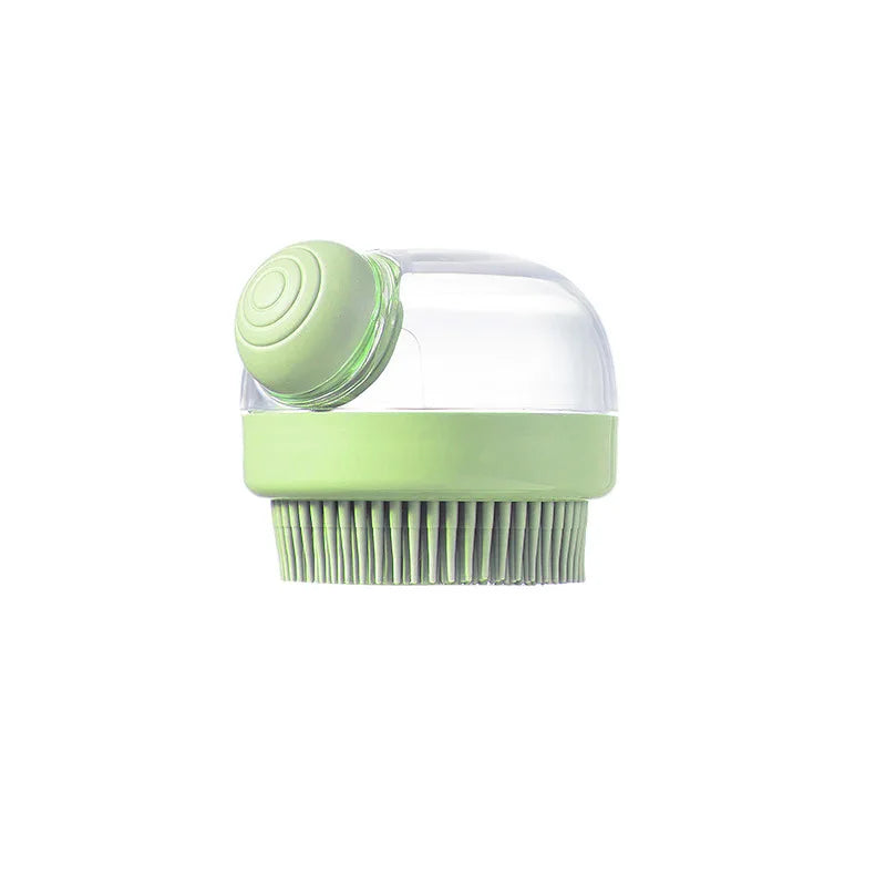 Close-up of green silicone pet bath brush with shampoo dispenser.