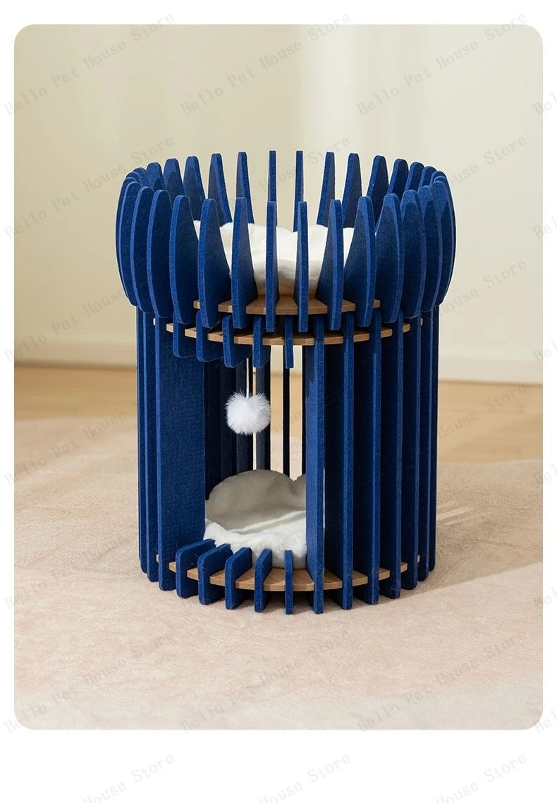 Dual-level modern blue cat tower with soft cushions and hanging toy ball.