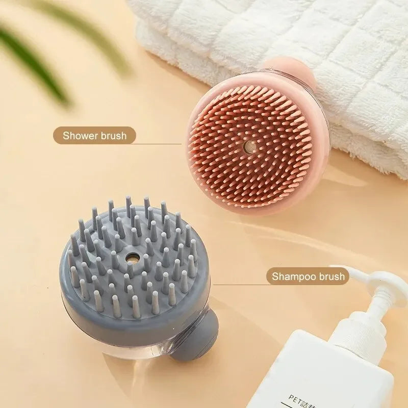 Two shower brushes, one pink and one gray, on a beige surface with a white bottle.