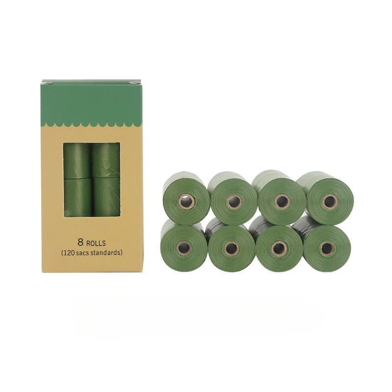 Set of green eco-friendly dog poop bags.